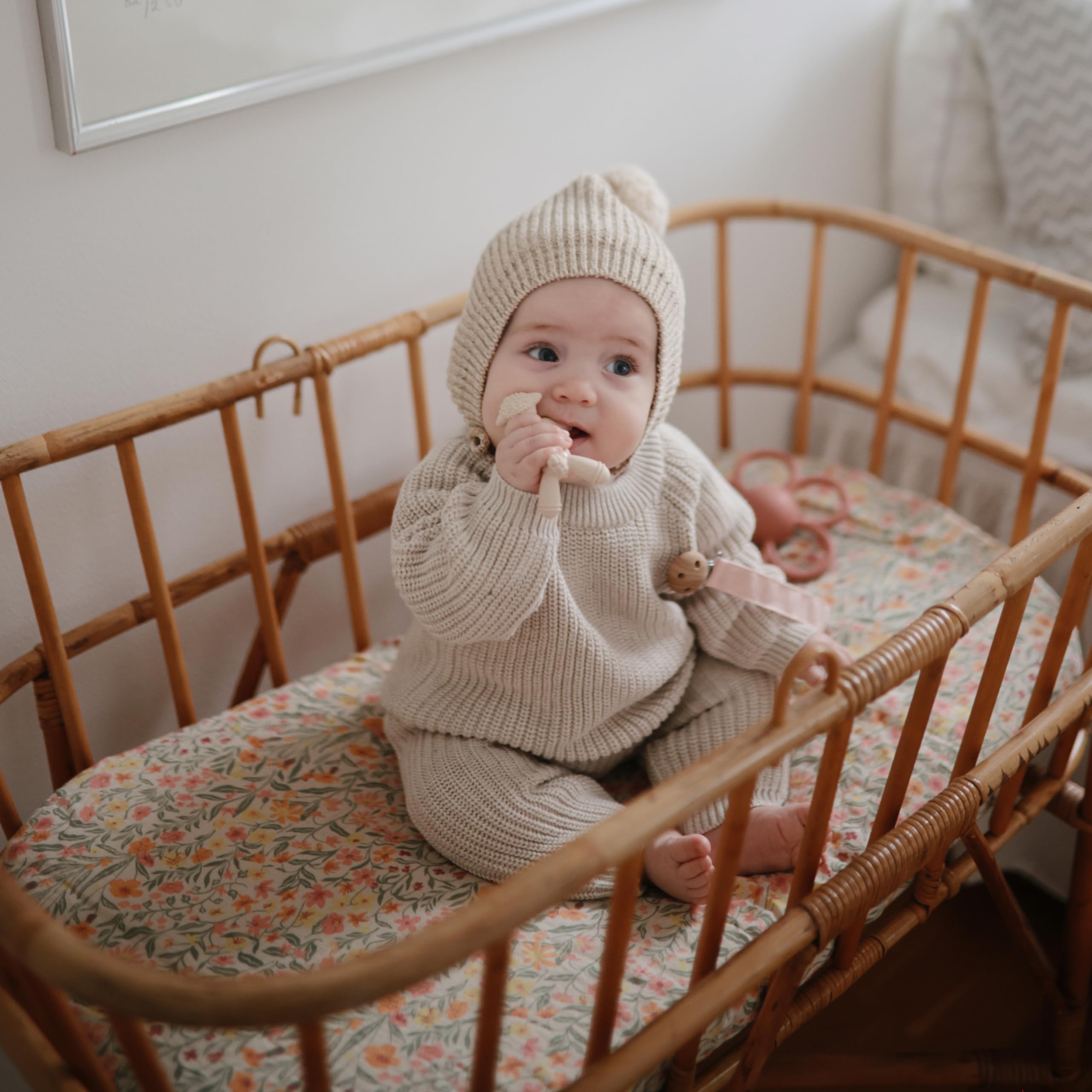 Mushie teether cleaning close-up demonstrates simple warm soap wash