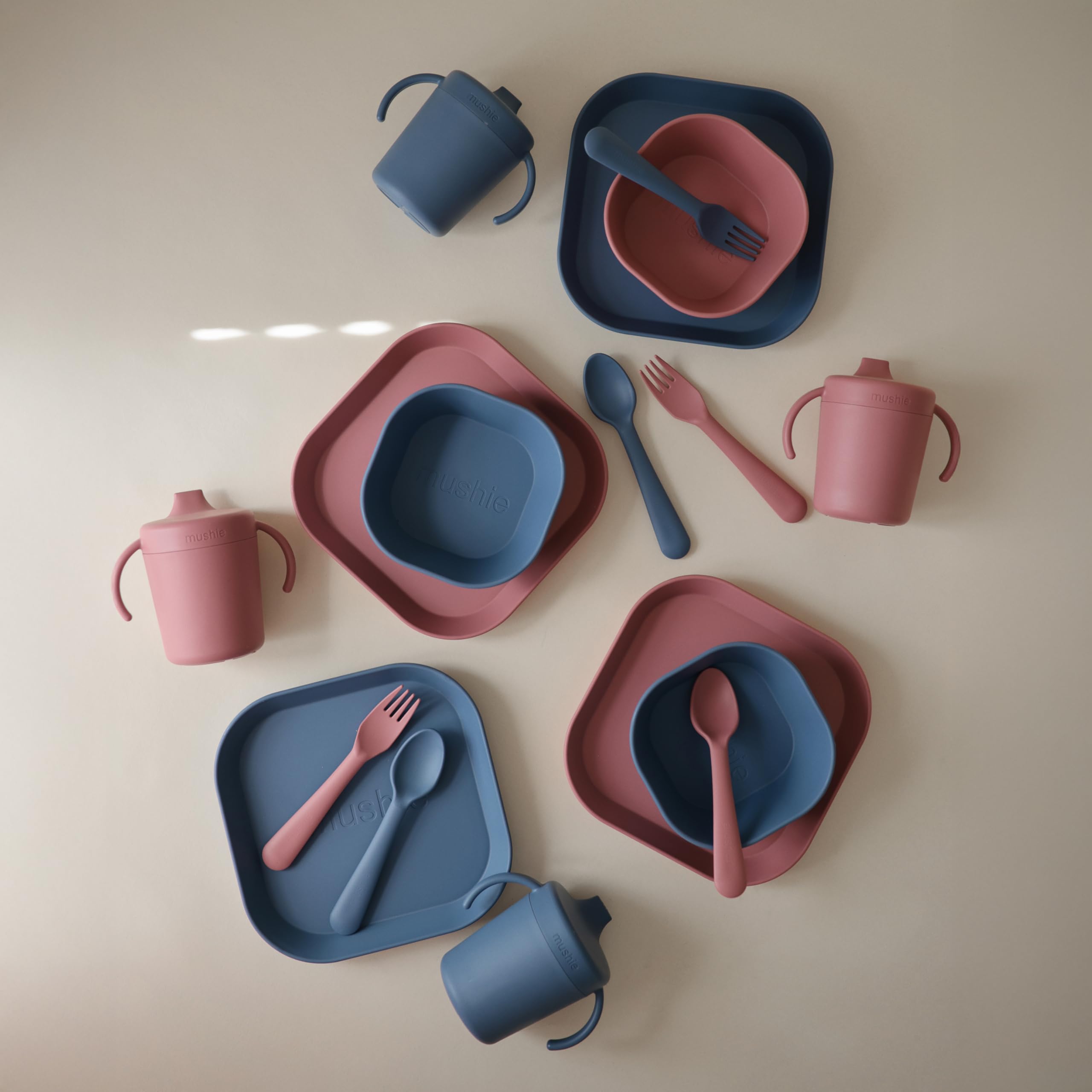 Mushie Twilight Blue flatware set on table with simple design