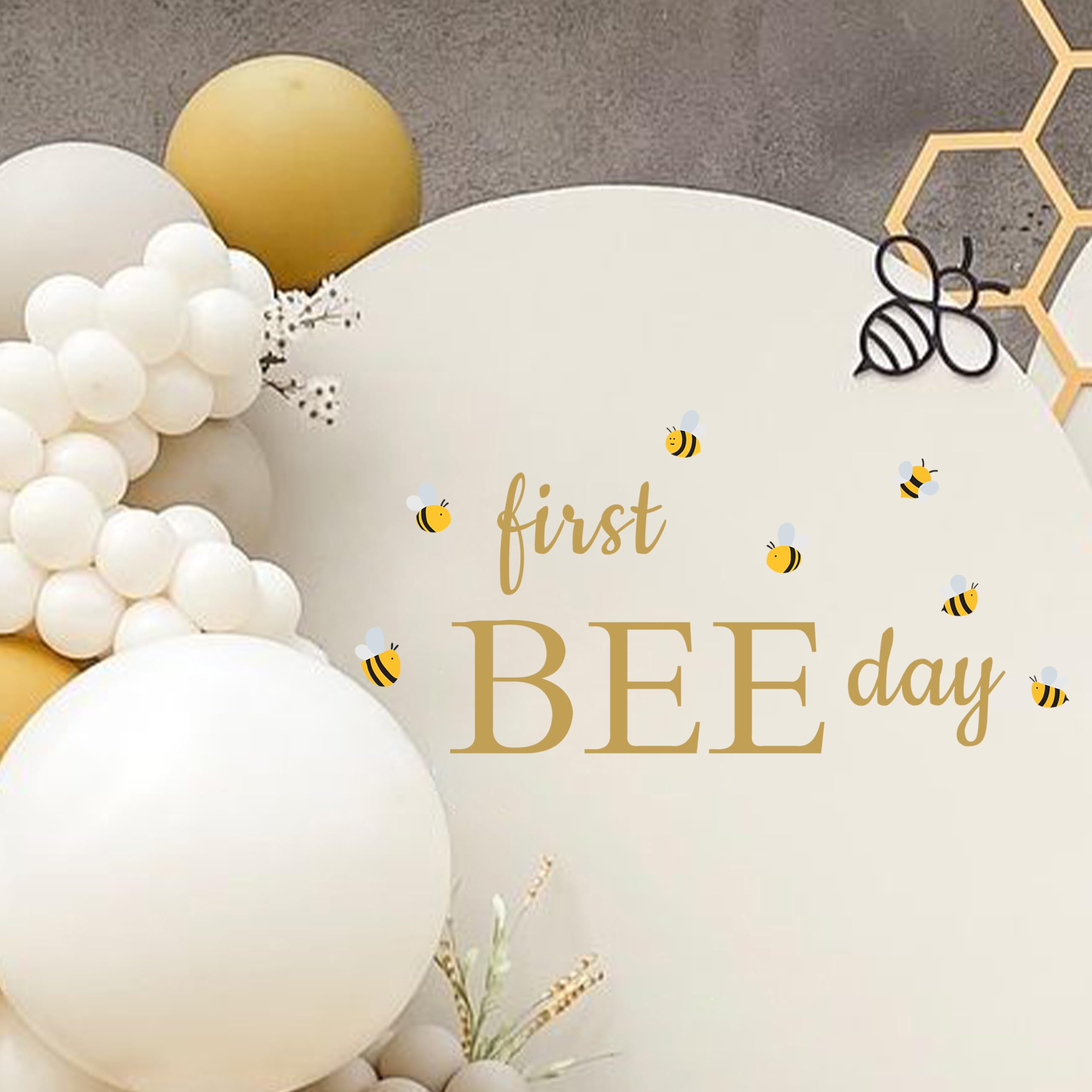 MUWEOL first bee day decal on a balloon arch enhances coordinated bee-theme party visuals.