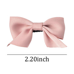 MXXGMYJ pink bow close-up showing the rose detail.
