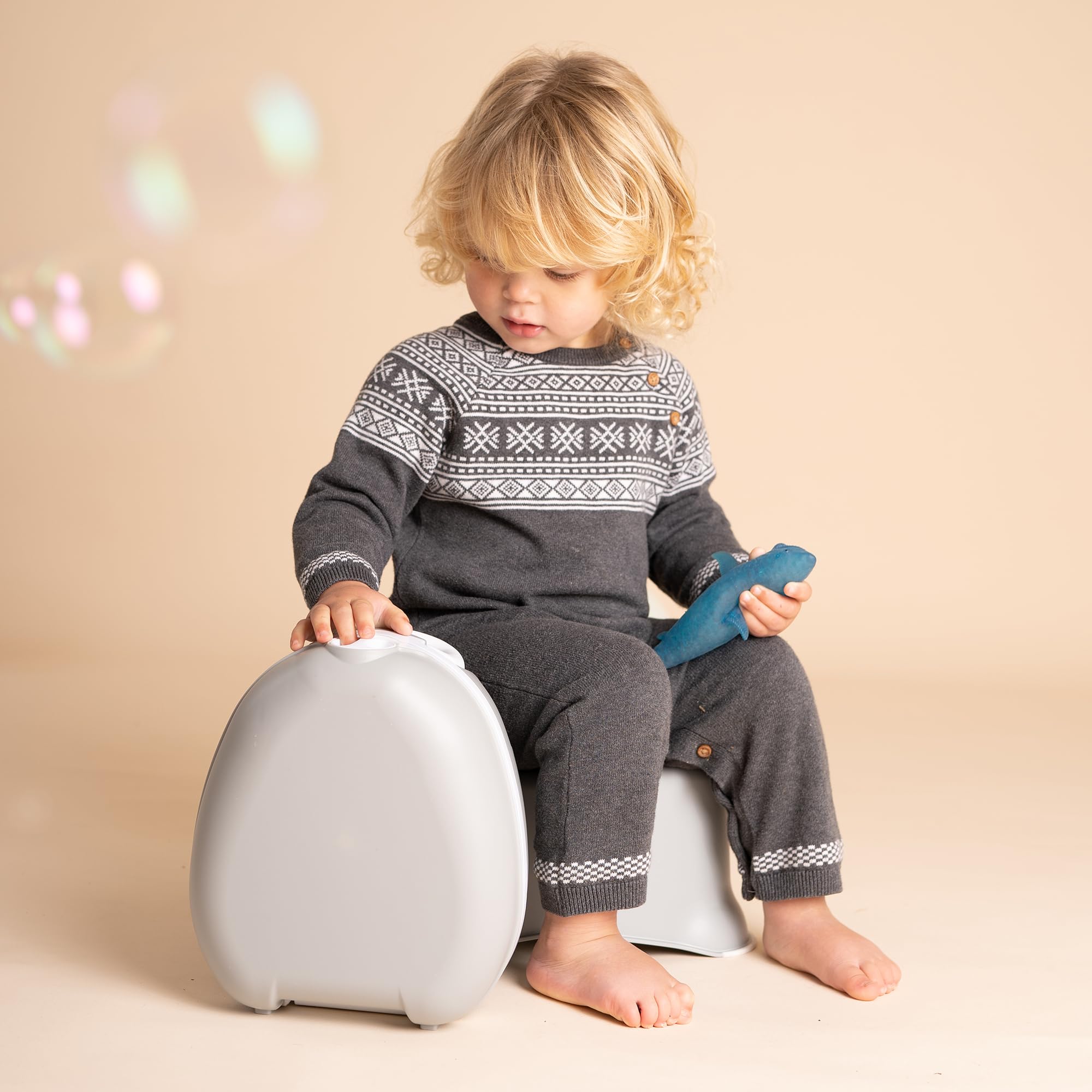 My Carry Potty extra-tall splashguard protects clothing during potty use.