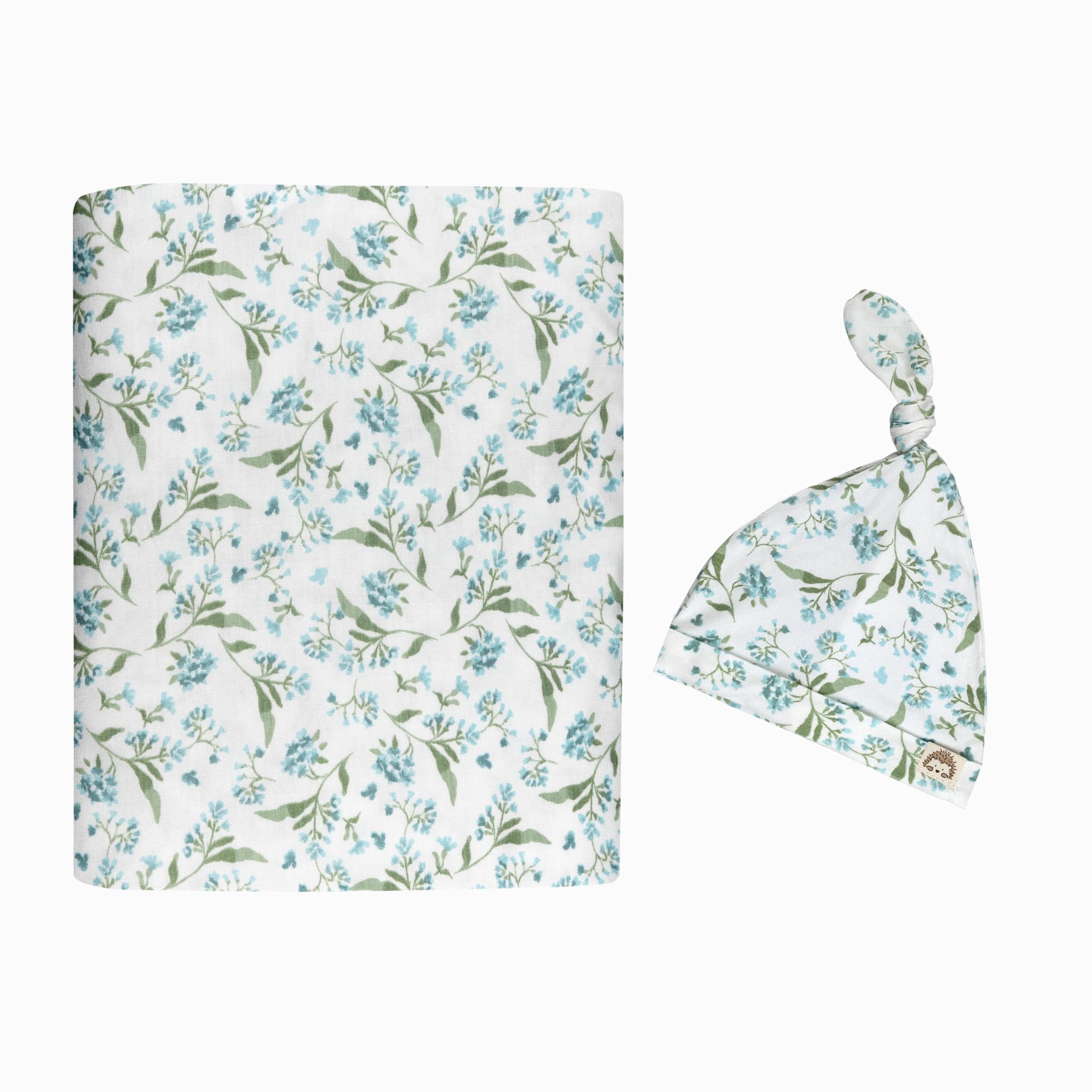 MY LITTLE ZONE botanical blue swaddle blanket offers soft, stretchy comfort for newborns.
