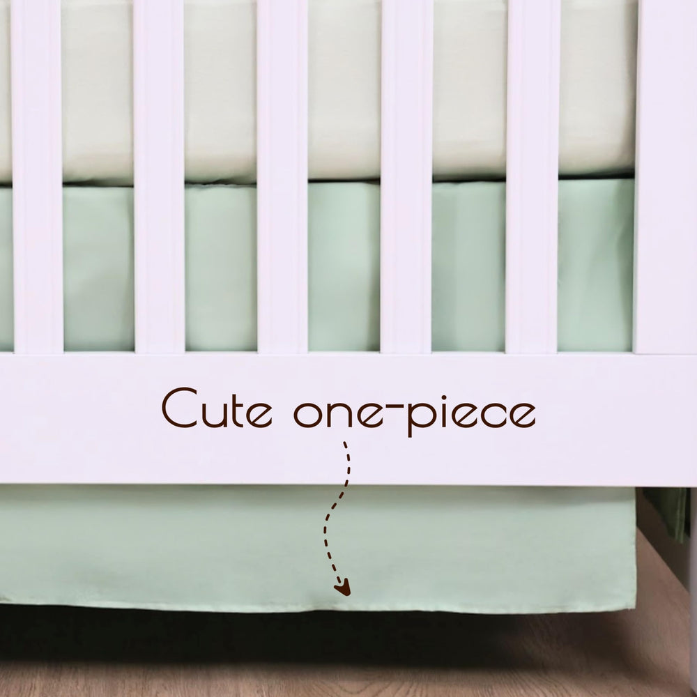 France-designed woodland crib skirt adds elegant touch to nursery decor.