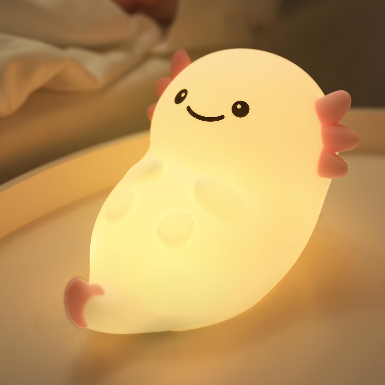 Myratts axolotl night light close-up shows a soft glow for bedtime.
