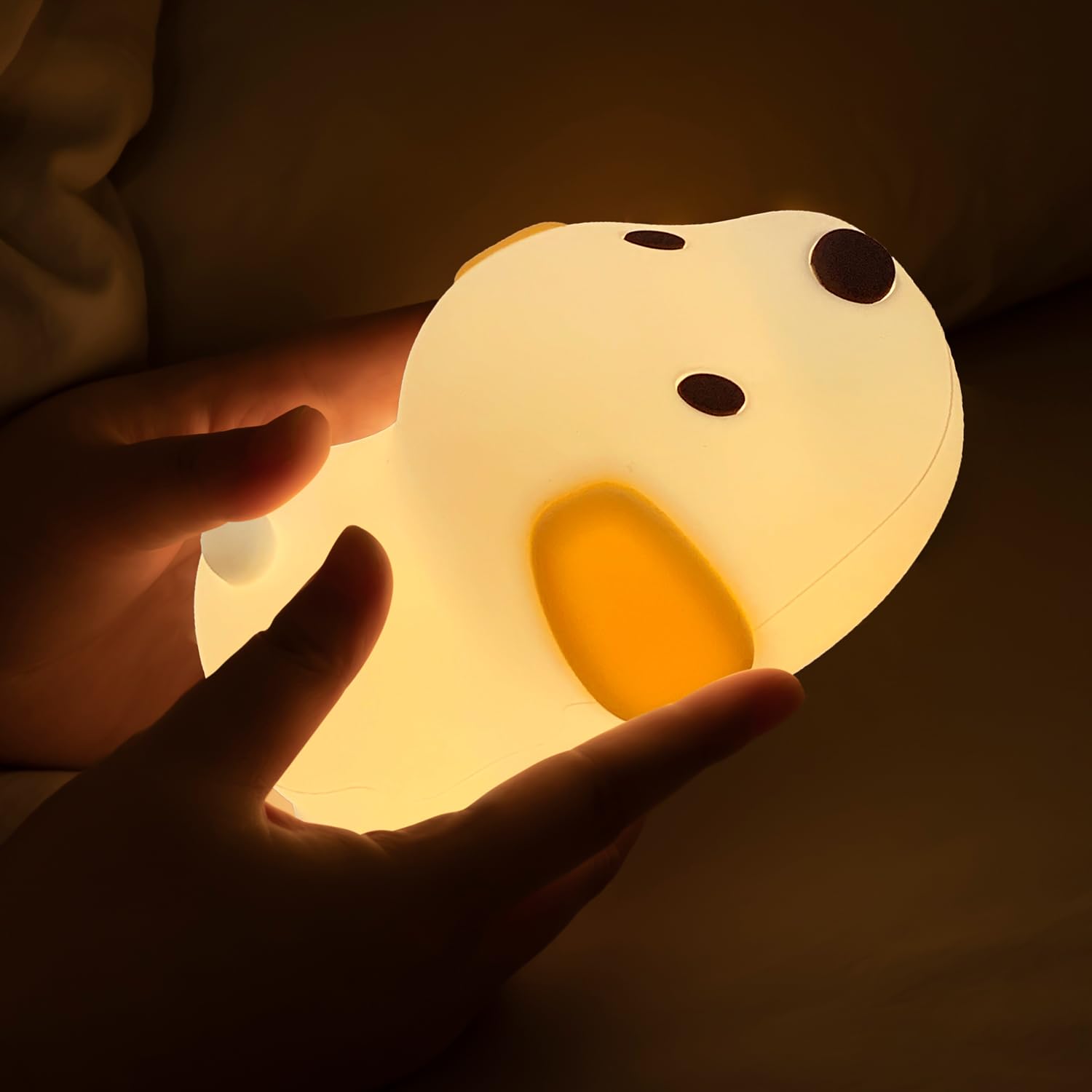 Myratts Puppy Night Light in soft warm light for cozy bedtime ambience.