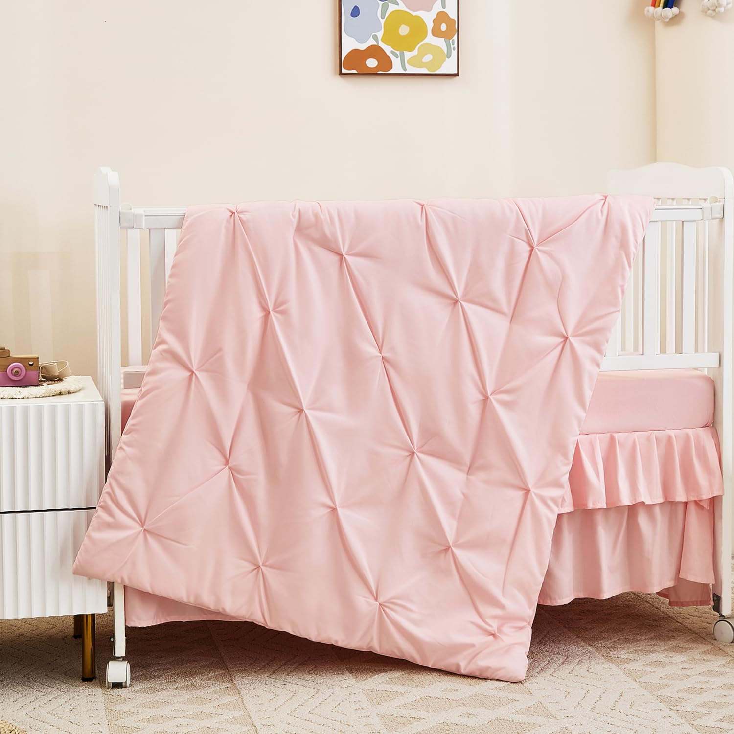 NacoMoco pink crib sheet highlights smooth texture and easy care
