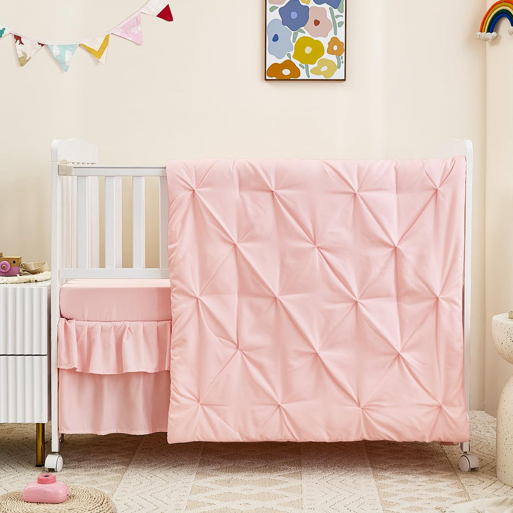 NacoMoco pink crib skirt completes the set with a clean nursery look