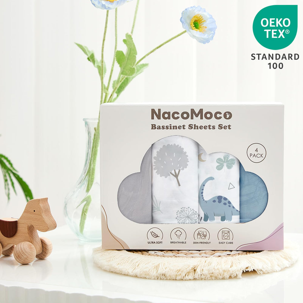 NacoMoco gift-ready bassinet sheets in attractive packaging for new parents.