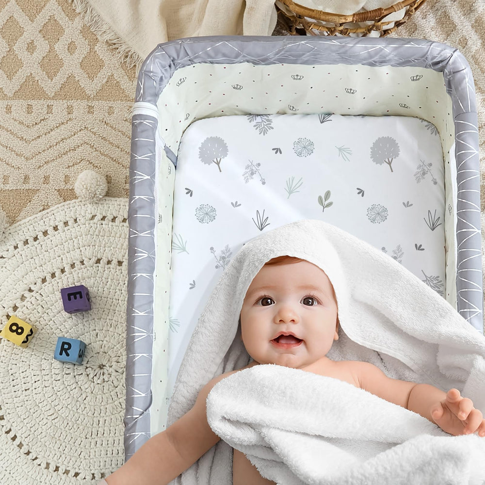 NacoMoco bassinet sheets soft brushed fabric for a gentle touch.