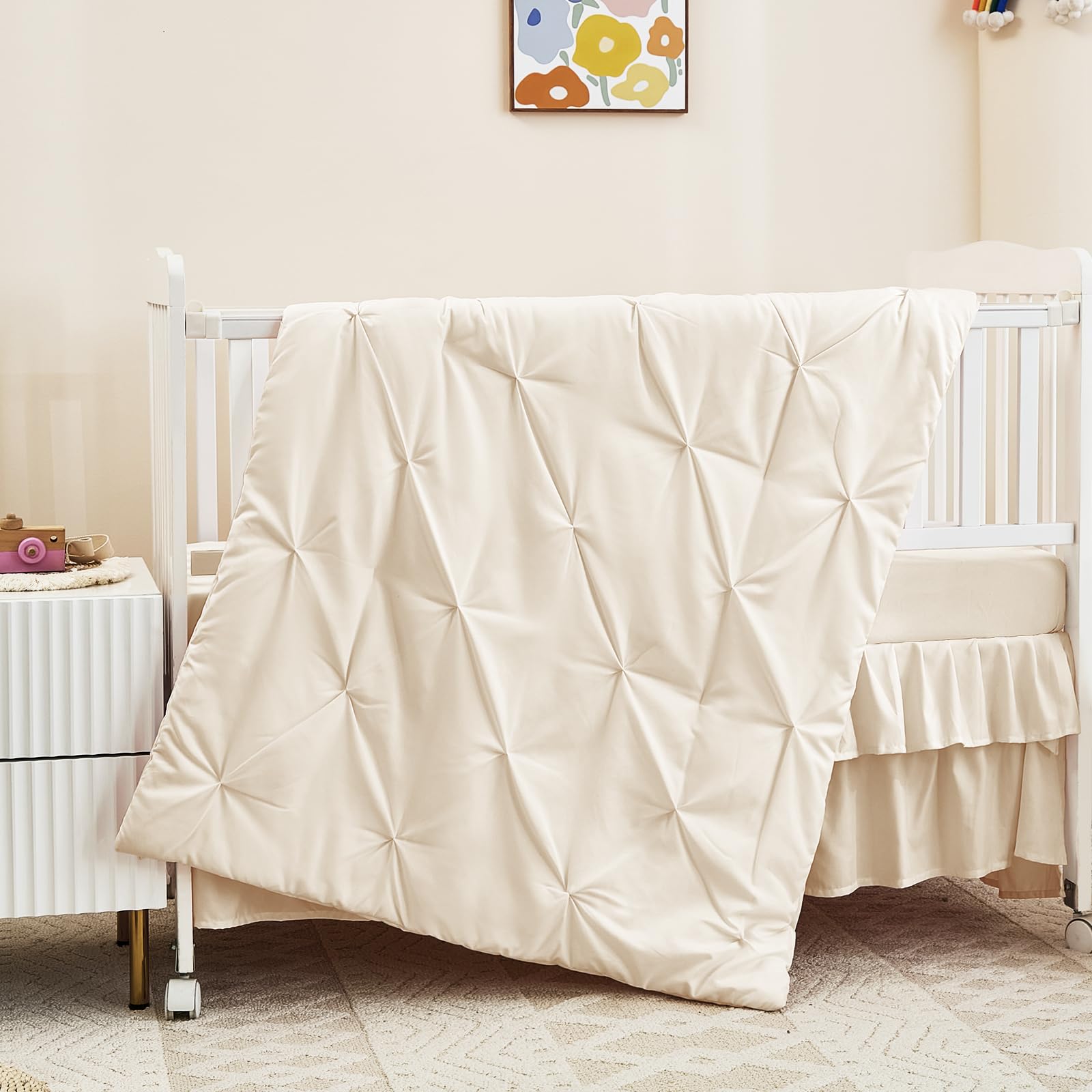 NacoMoco crib bedding fabric close-up reveals ultra-soft microfiber gentle on baby's skin.