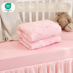 NacoMoco crib comforter 35x45 light pink—cozy warmth for naps and bedtime.