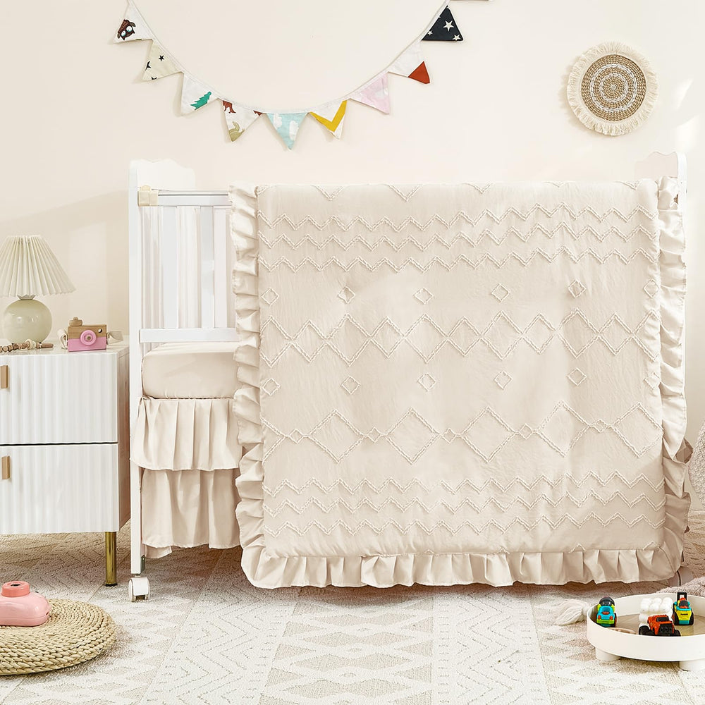 NacoMoco crib comforter texture closeup shows durable microfiber and cozy warmth.
