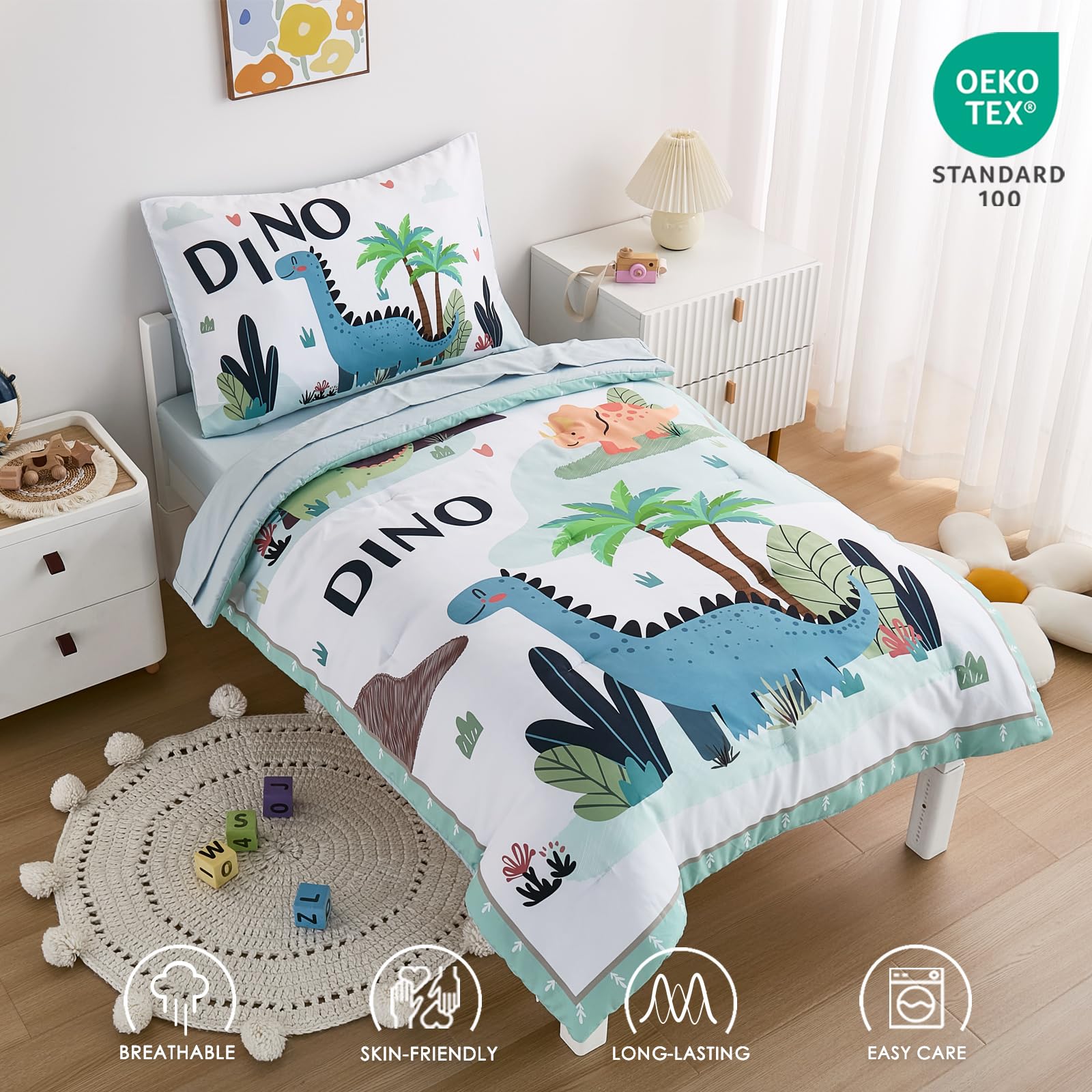 NacoMoco dinosaur fitted sheet in mint green provides snug fit for standard toddler beds