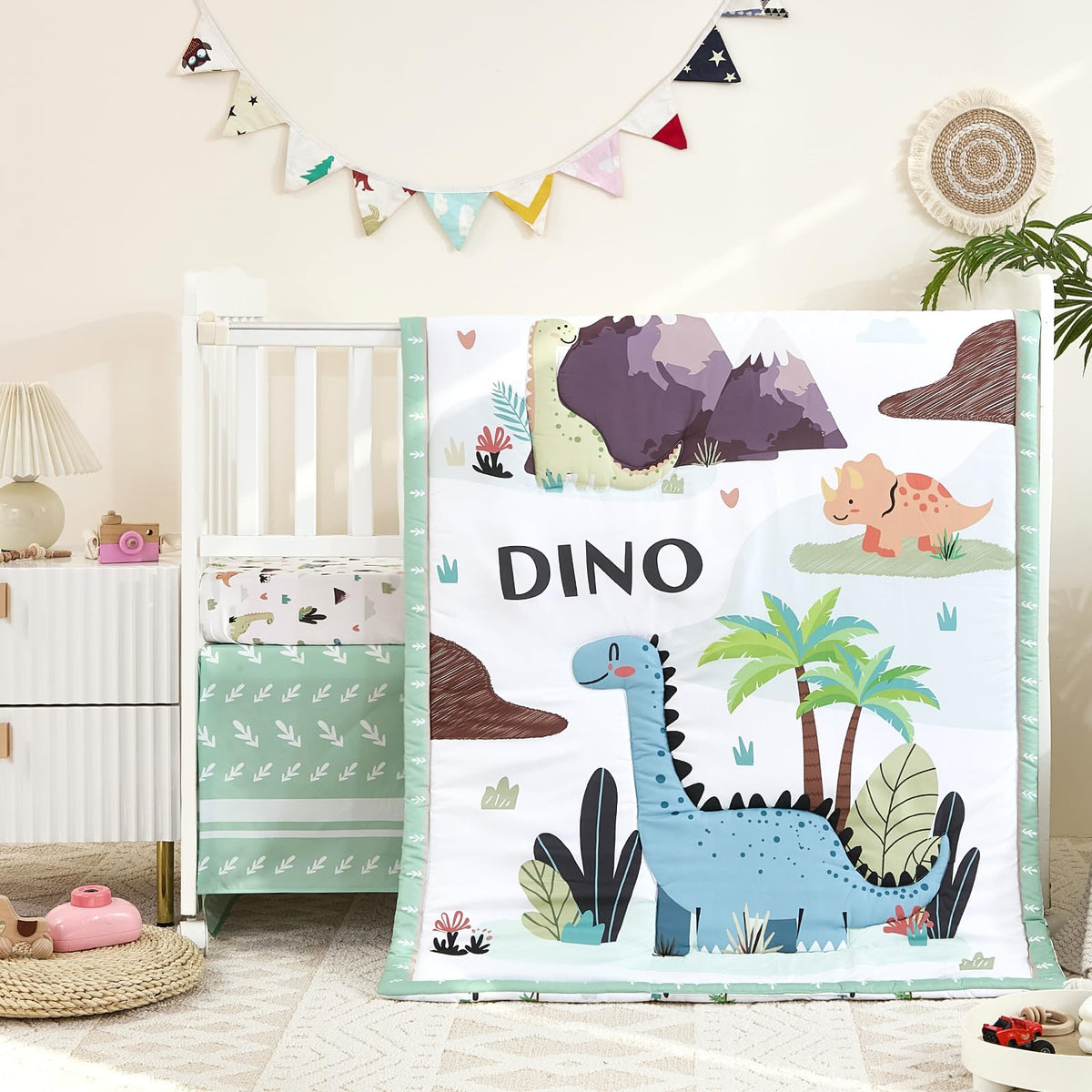 NacoMoco dinosaur crib comforter for gentle warmth and breathable sleep
