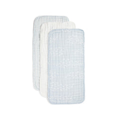 Nana Baby Organics burp cloths folded in powder blue and cream for soft skin protection.