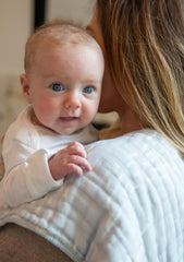 Nana Baby Organics oversized burp cloth offers full coverage during feeding.
