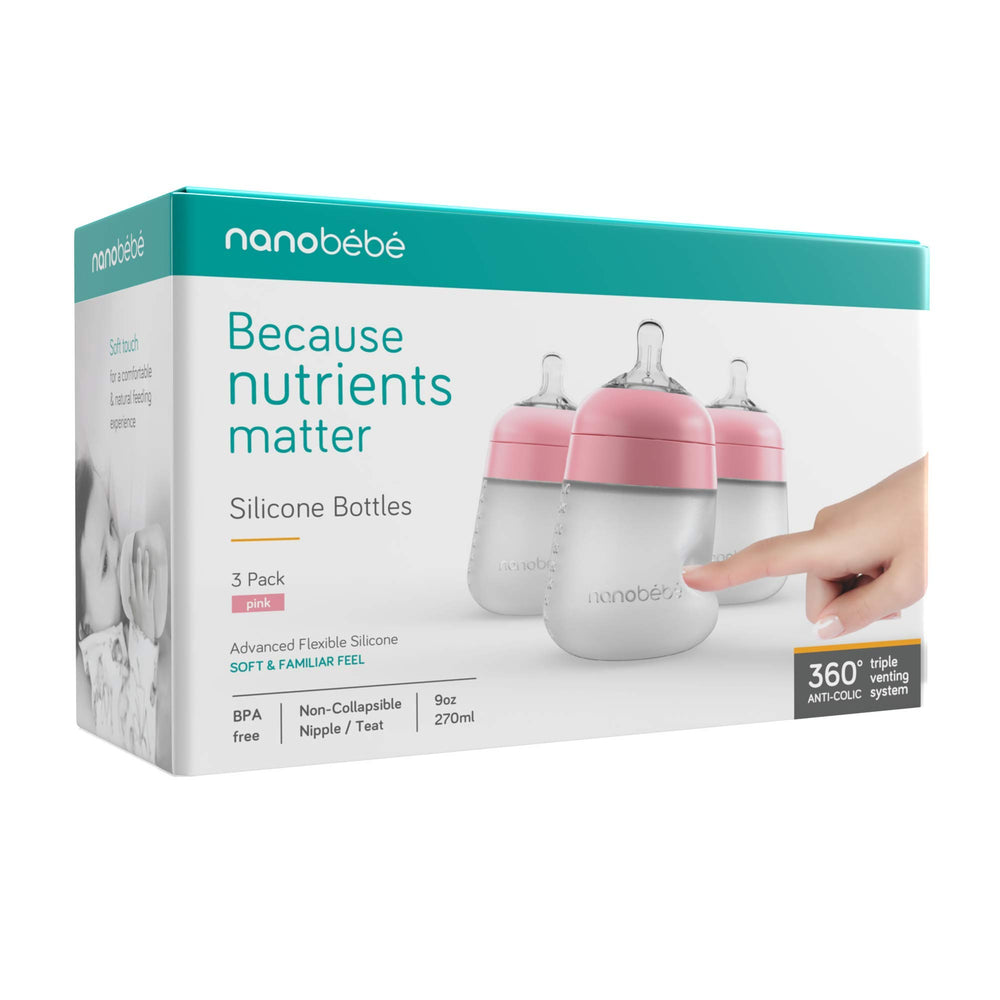 Nanobebe Flexy bottle in pink held by parent for on-the-go feeding