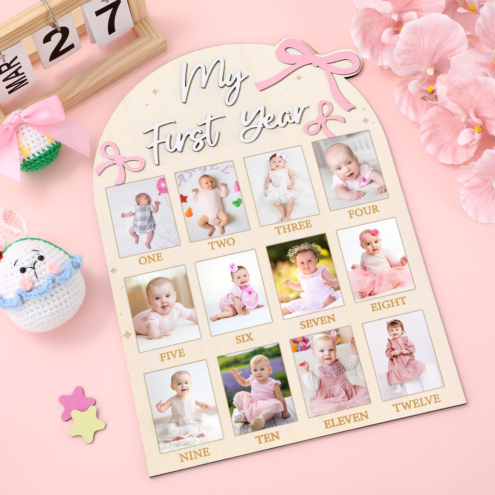 Naozinebi soft arch with pink bow detail on wood board