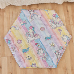 NapCure hexagon play mat with unicorn design, plush tummy-time surface for babies.