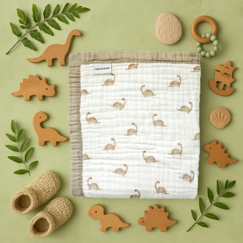 Natchiketa muslin blanket doubles as a stroller cover for shade and protection.