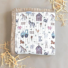 Natchiketa muslin blanket swaddle setup demonstrates cozy wrap for soothing newborns