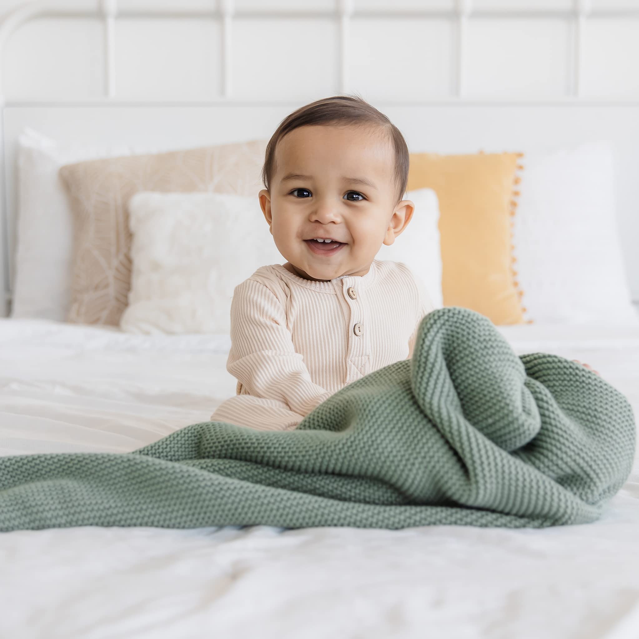 Natemia tummy-time mat substitute provides a soft, breathable surface.