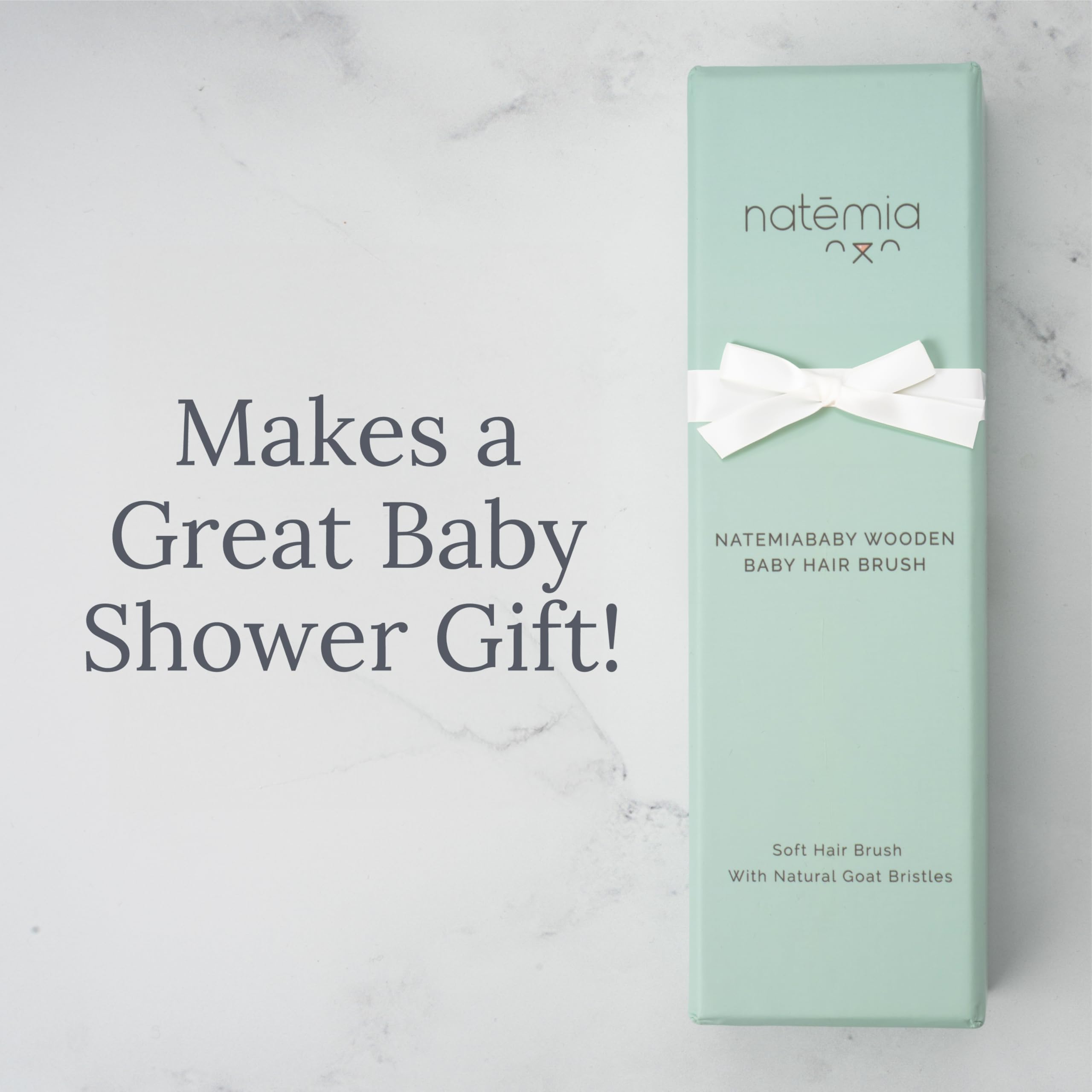 Natemia gift-ready baby brush, a thoughtful addition to a grooming kit.