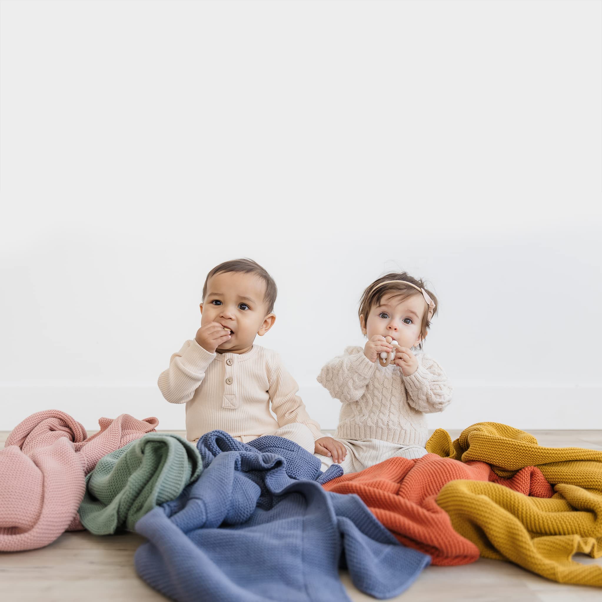 Natemia neutral beige knit blends with any nursery decor.
