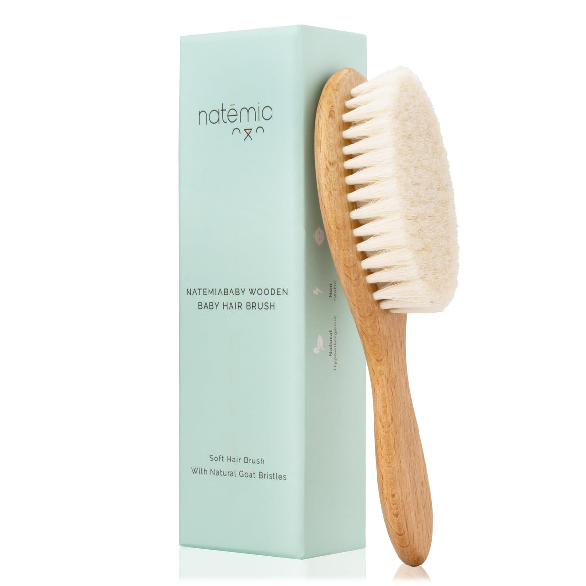 Natemia wooden baby hair brush with soft goat bristles for gentle scalp care.