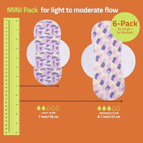 Natissy pad wings with three snaps and two extenders for adjustable fit.