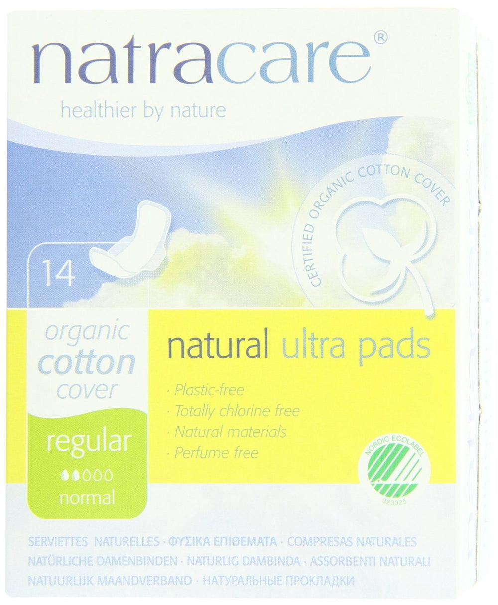 Natracare pad with wings shown inside packaging, soft absorbent surface and no perfumes or dyes.