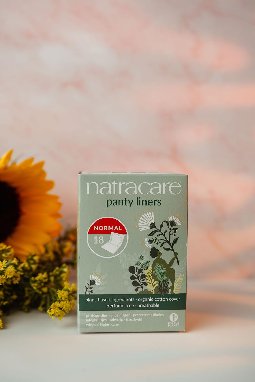 Close-up of Natracare panty liner normal wrapped packaging showing discreet design.