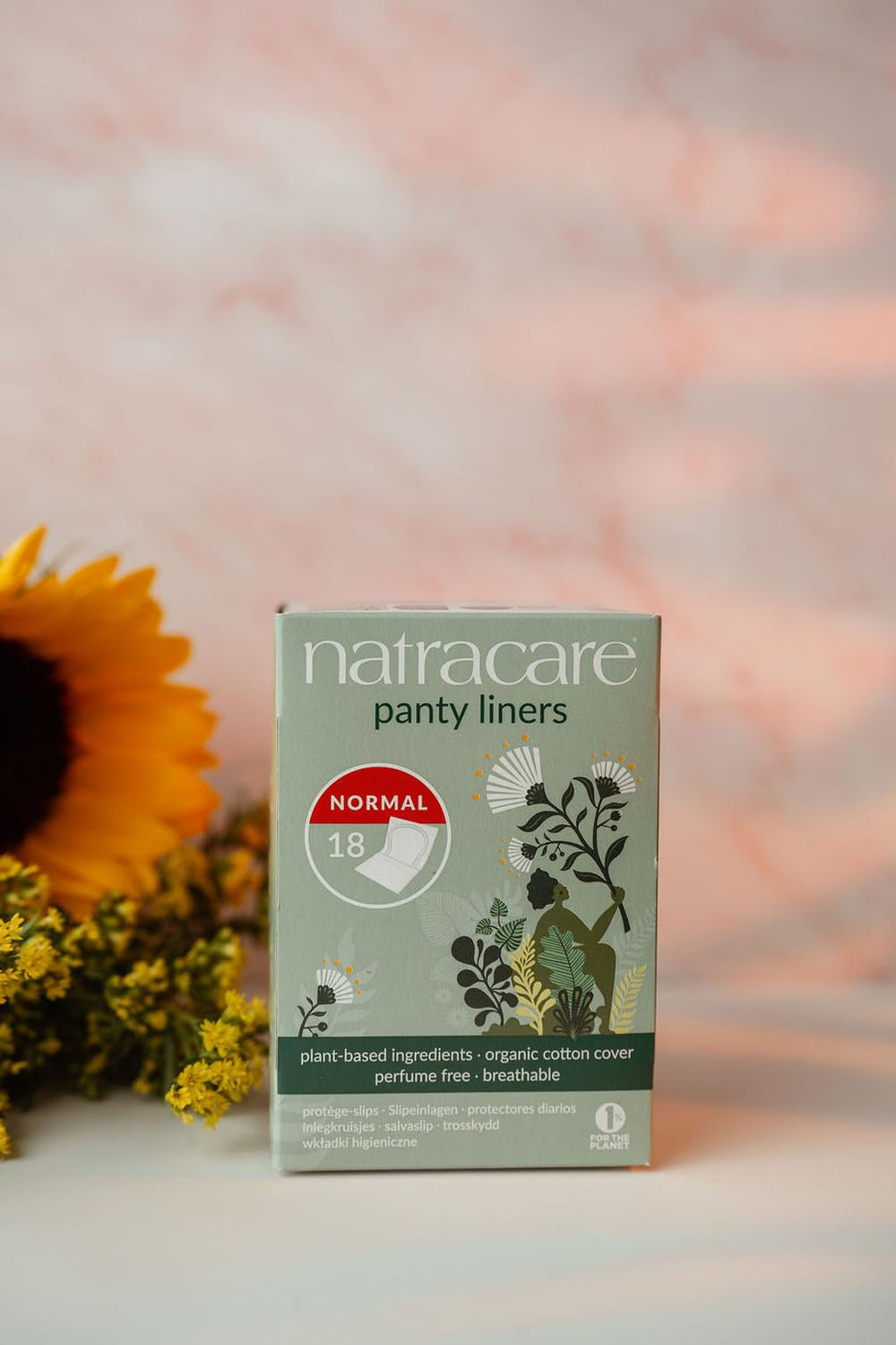 Close-up of Natracare panty liner normal wrapped packaging showing discreet design.