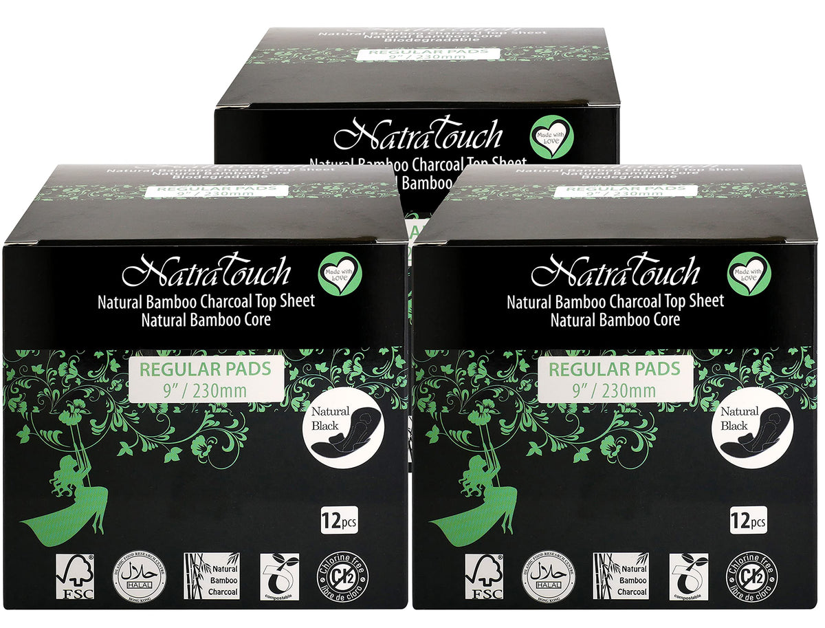 Natratouch compostable bamboo charcoal regular pad in packaging, eco-friendly choice for daily use.