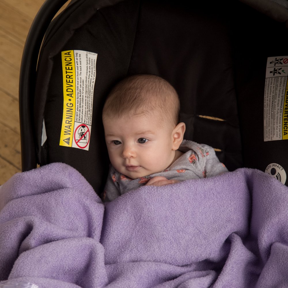 Natural Snuggles travel-use image on stroller for on-the-go comfort