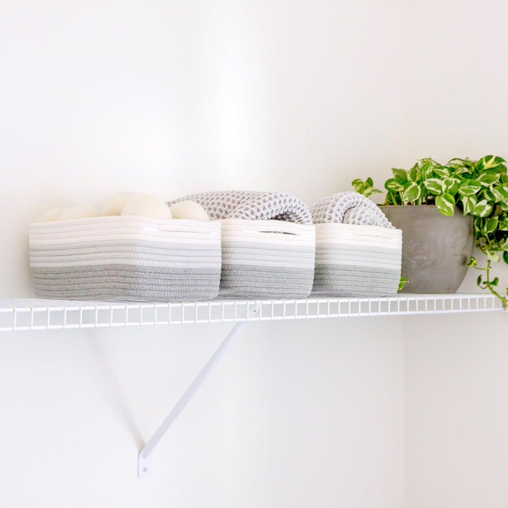 NaturalCozy bathroom storage basket for towels and toiletries.