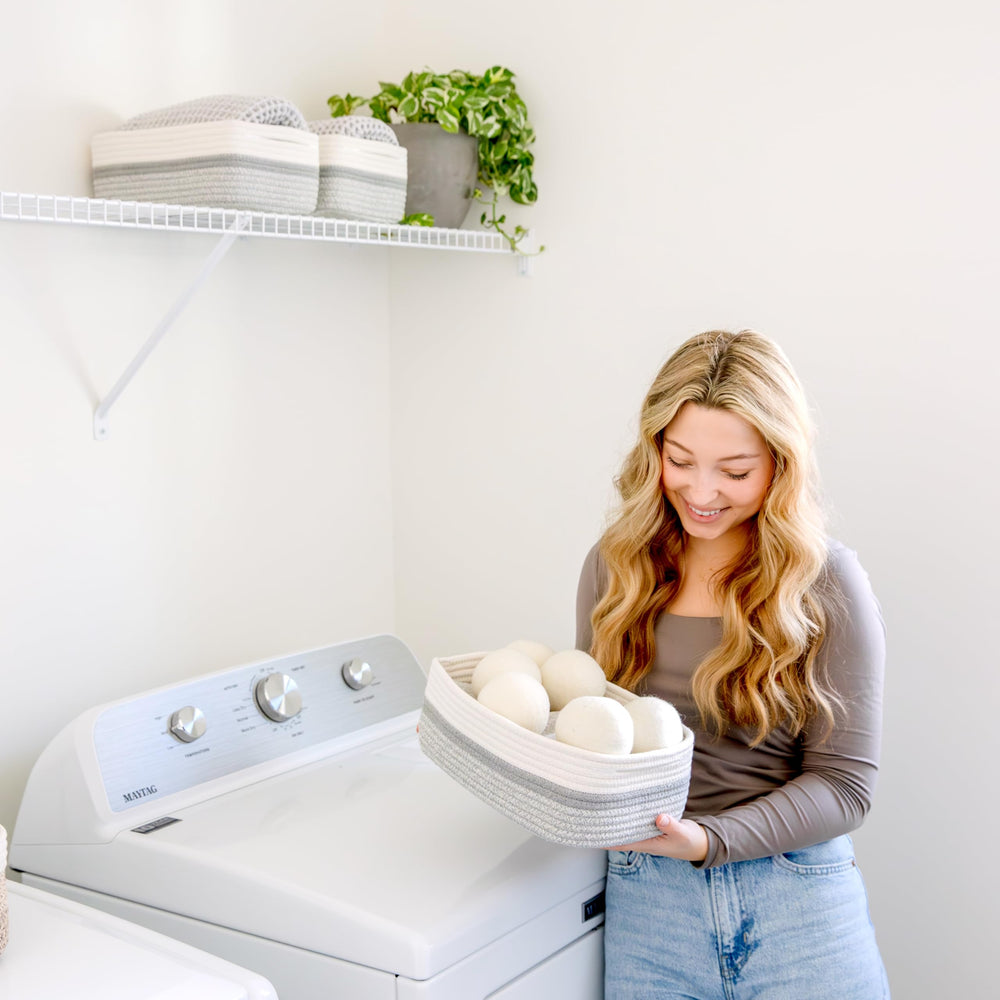 NaturalCozy bathroom setup using rope basket for toiletries and towels