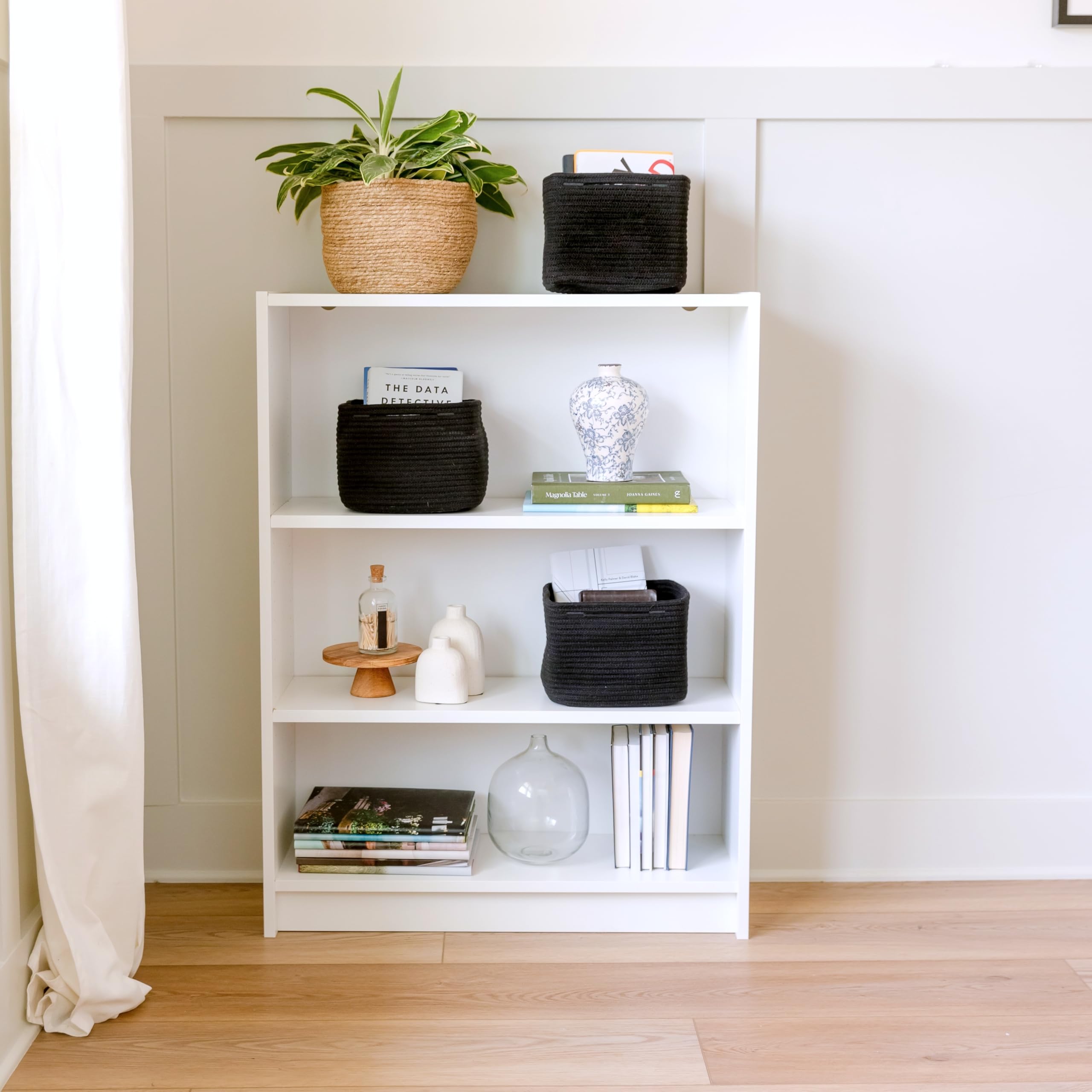 NaturalCozy nursery toy storage on shelves keeps playroom neat and accessible.