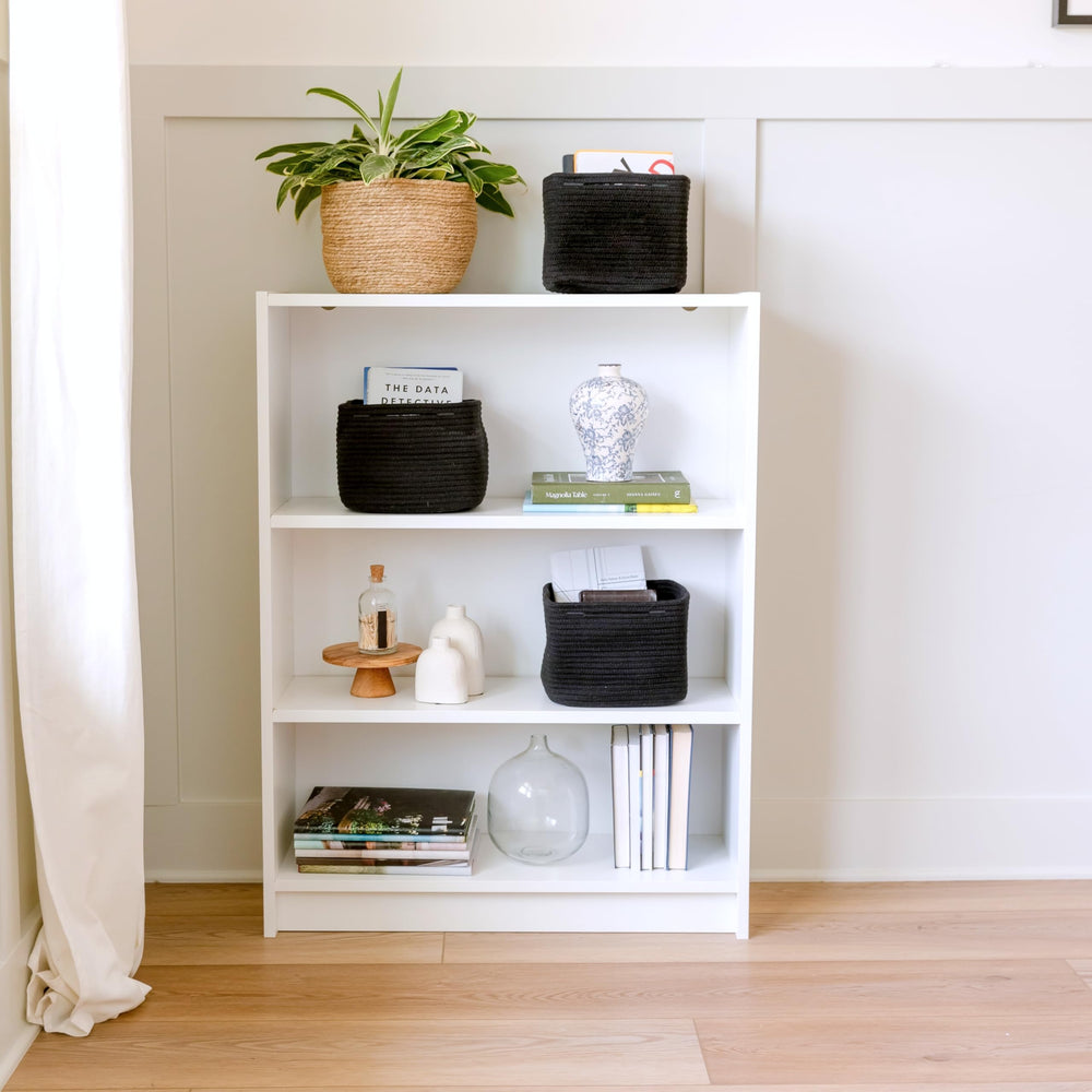 NaturalCozy nursery toy storage on shelves keeps playroom neat and accessible.