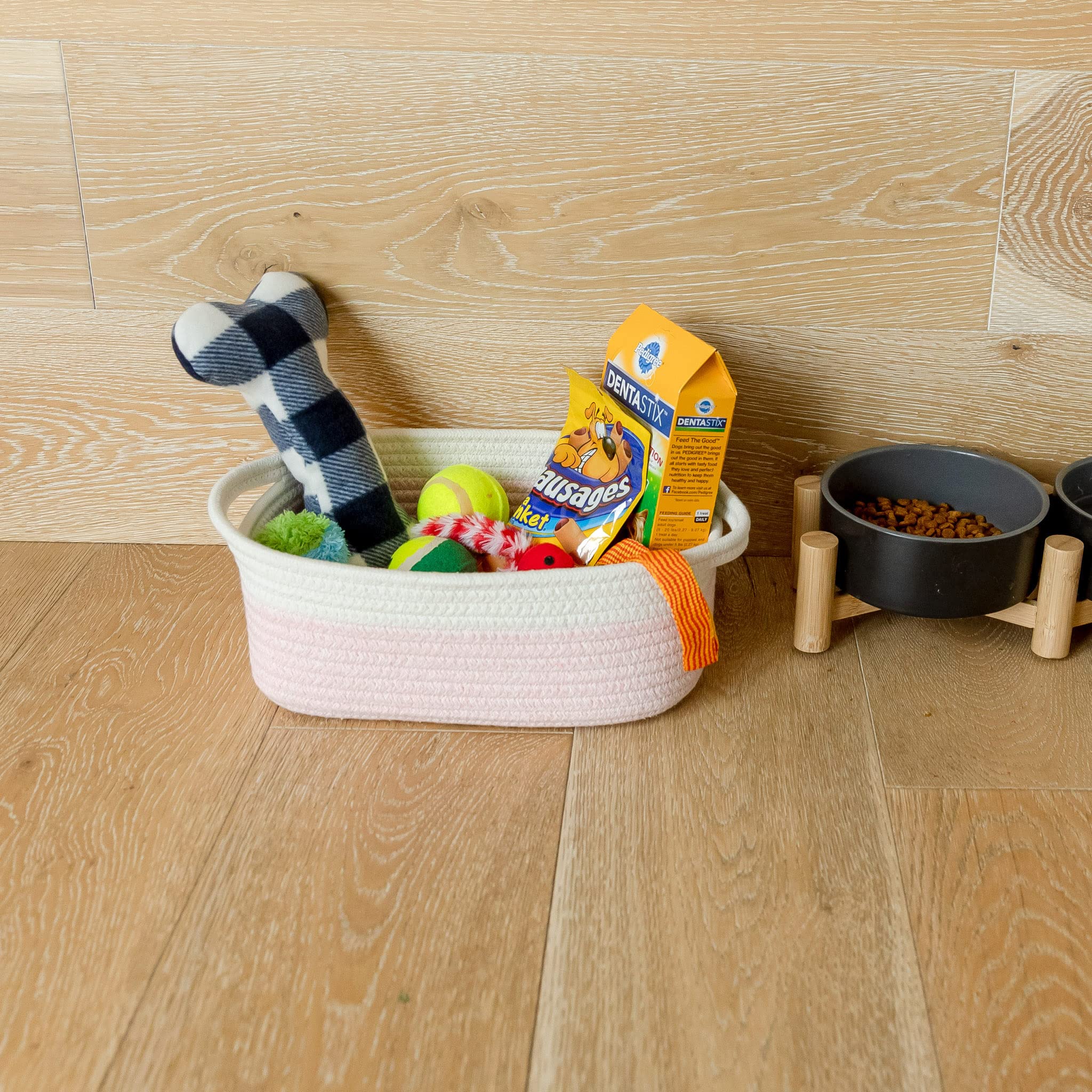 NaturalCozy pet toy basket keeps dog and cat toys in one place.