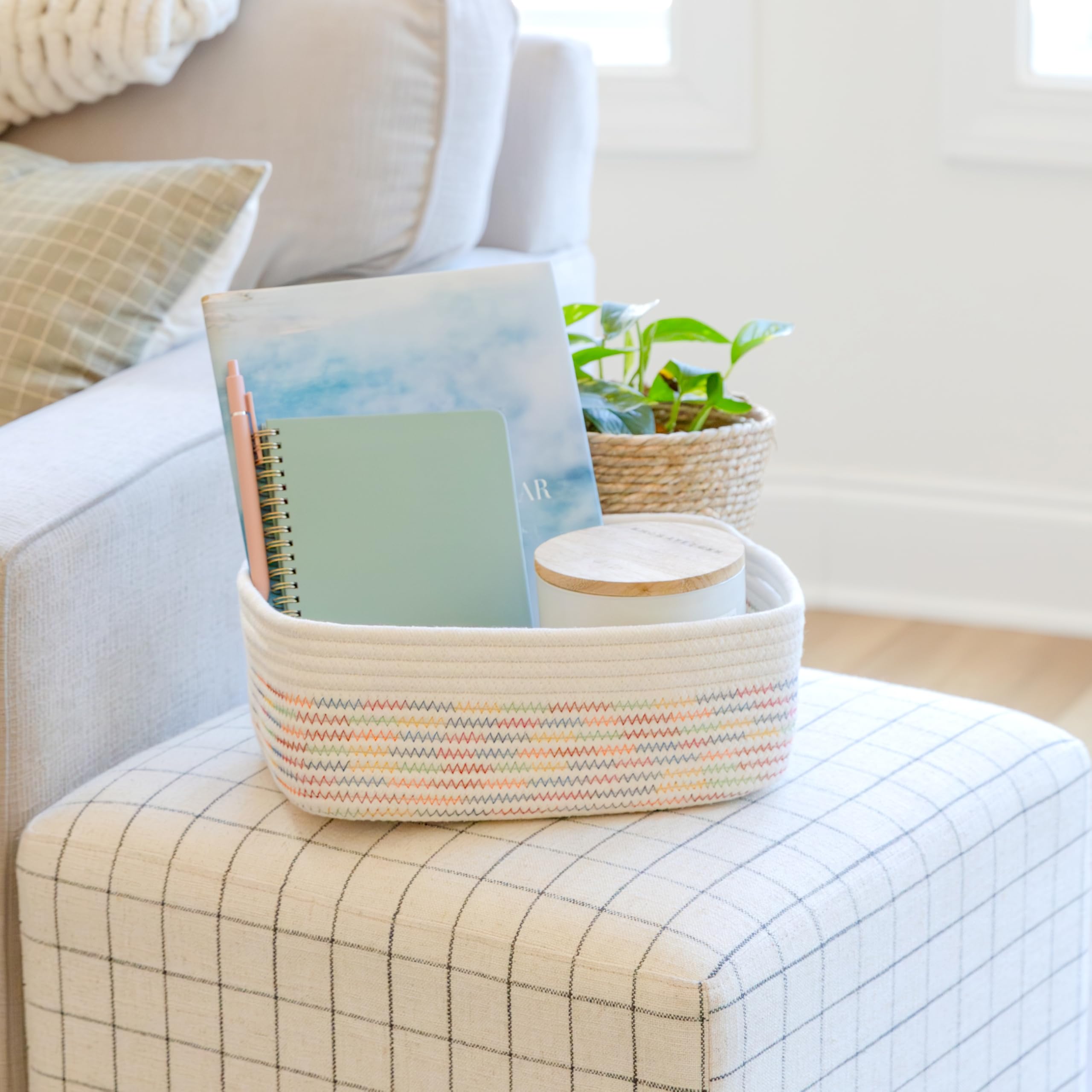 NaturalCozy rectangle basket in bathroom closet setup for quick access and organization.