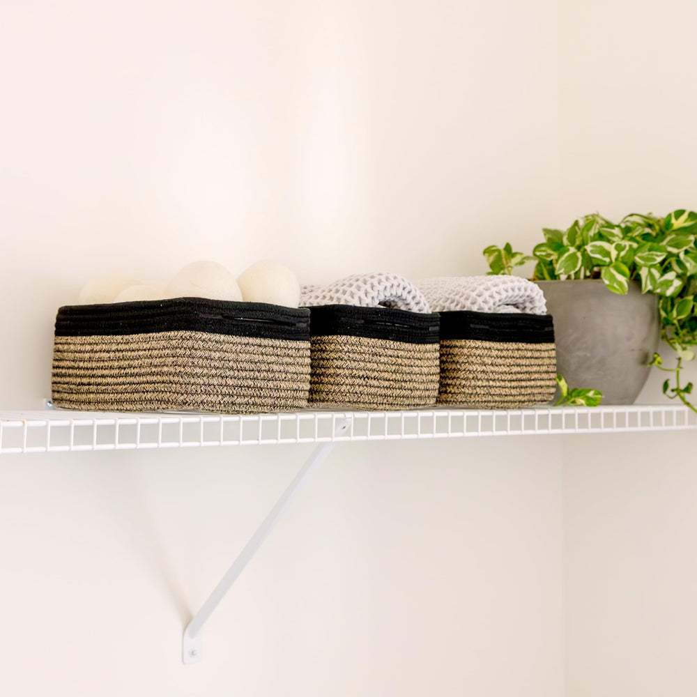 NaturalCozy bathroom storage basket containing toiletries neatly