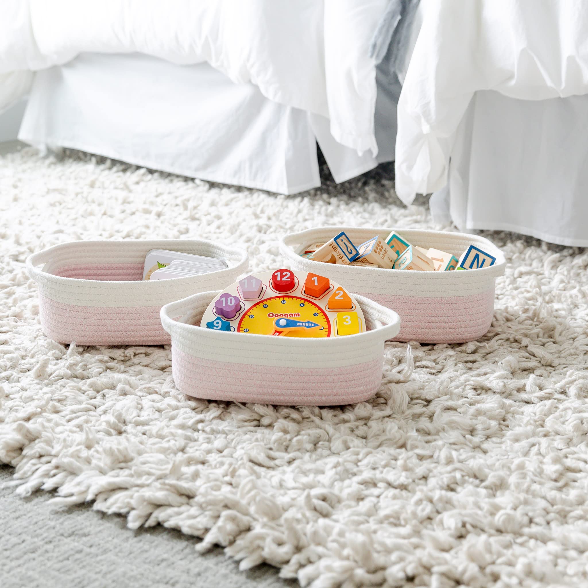 NaturalCozy reinforced-handles rectangle basket stands up to busy family use.