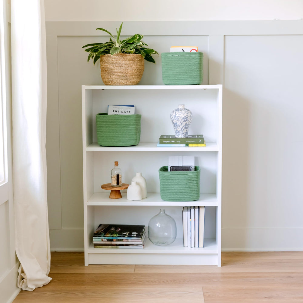 NaturalCozy storage cubes beside a decorative plant blending minimalist decor with storage