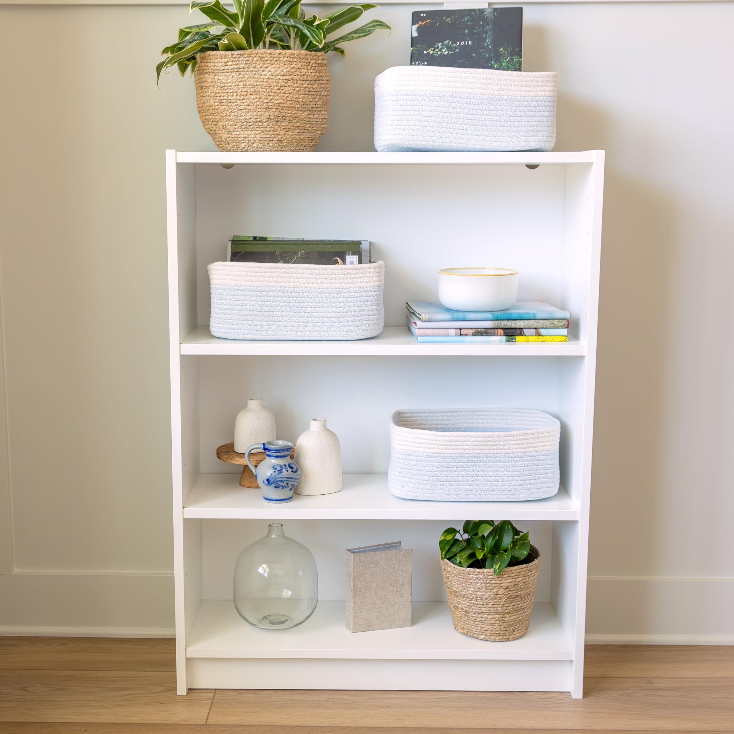 NaturalCozy toy and book storage in a nursery closet setup.