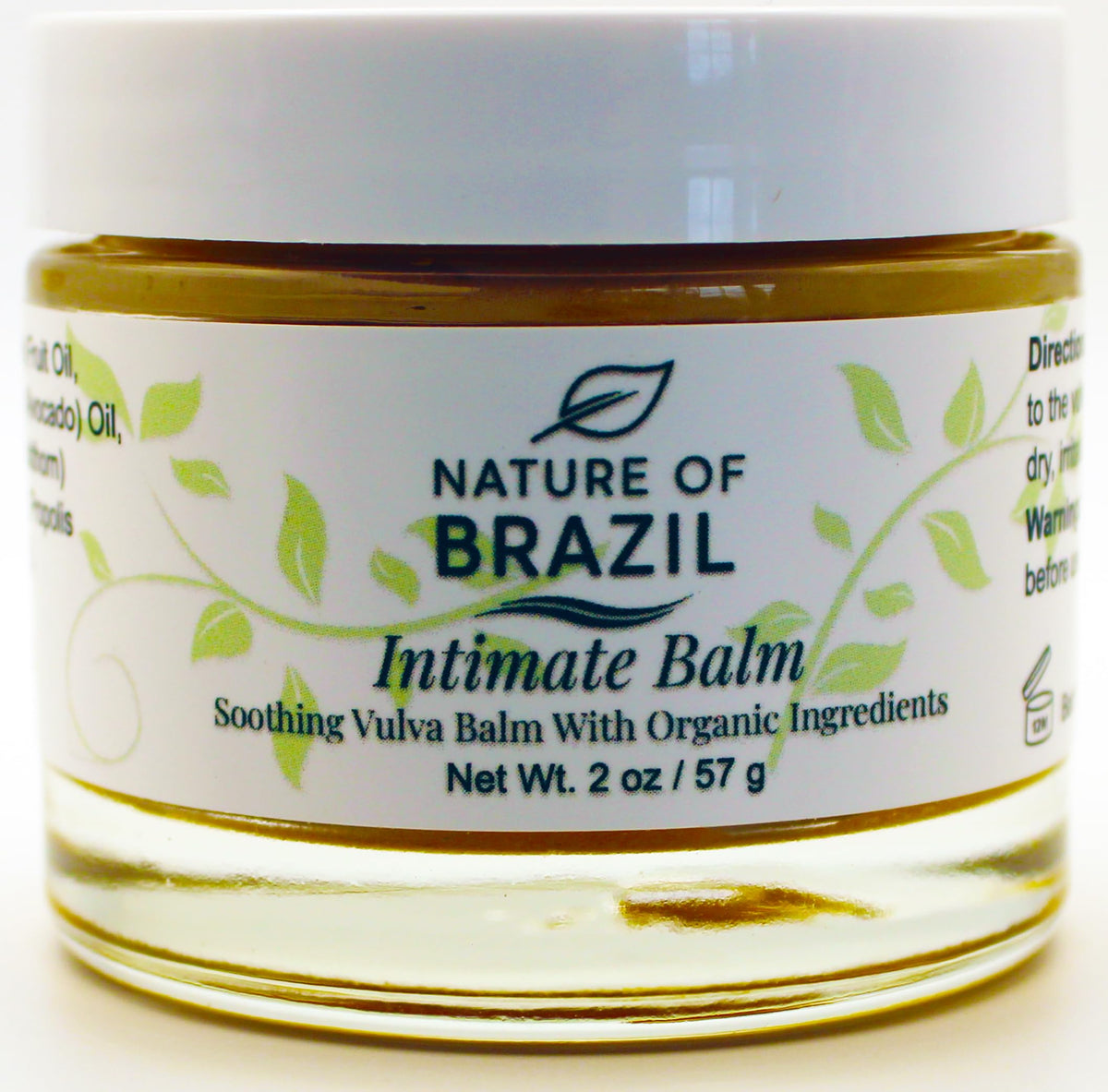 Nature of Brazil Vulva Balm jar close-up showing creamy texture for intimate skin care.