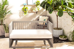 Naturepedic 2-stage mattress side view ideal for infant to toddler transition