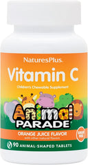 Child enjoying a NaturesPlus Animal Parade vitamin C chew with a smile.