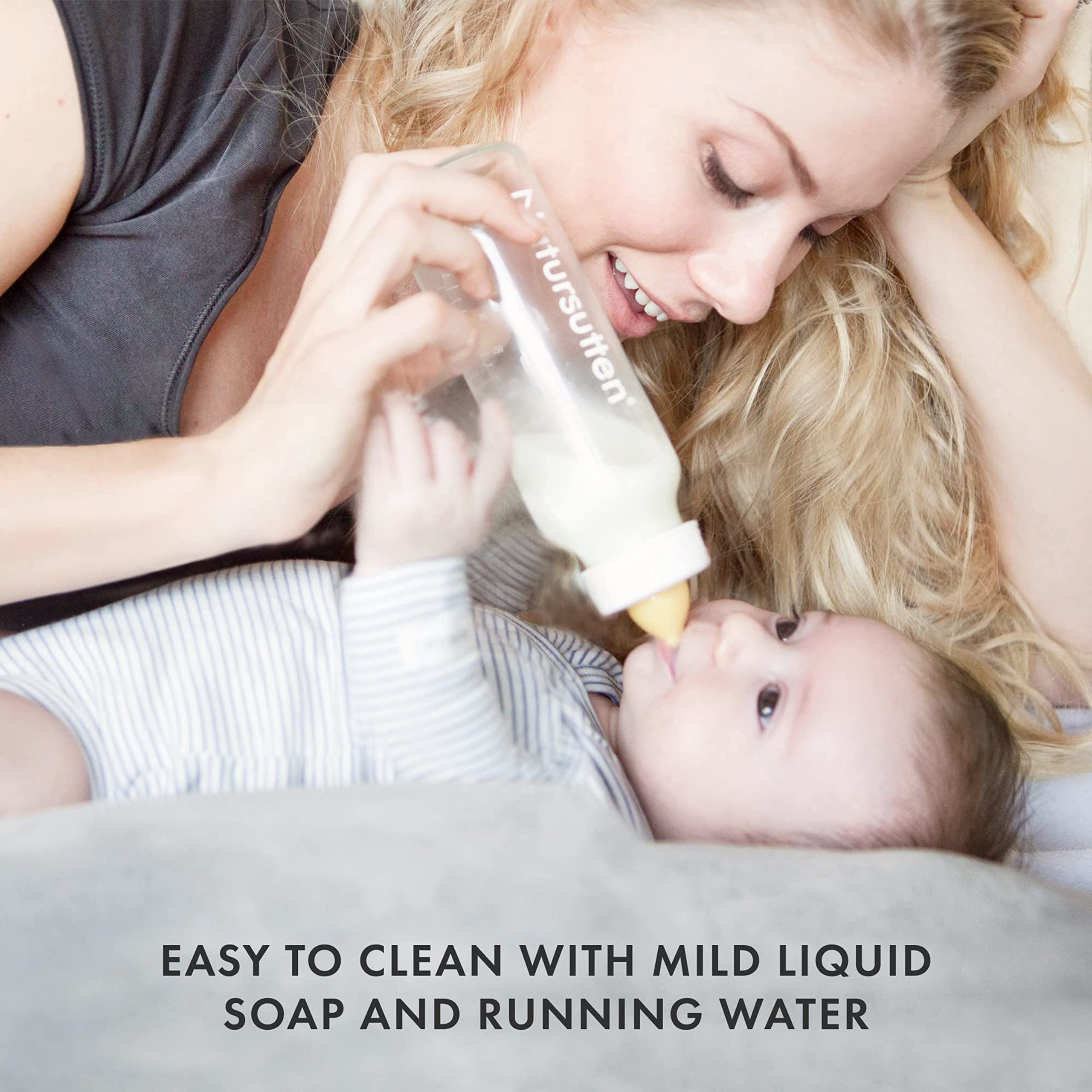 Handheld Natursutten nipple highlights soft texture ideal for teething babies.
