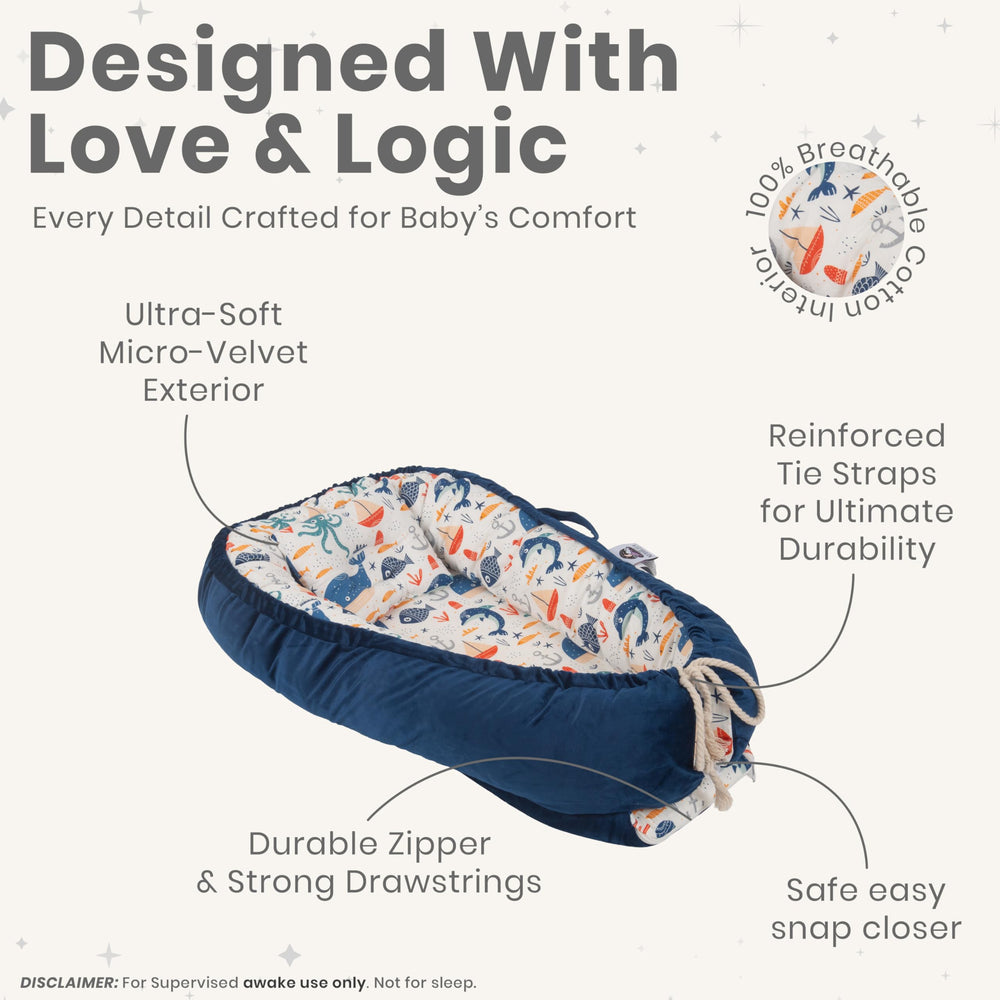 Nebulita newborn lounger blue used for bottle feeding at a gentle, supported angle.